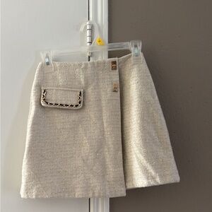 Elegant Cream Skirt with Pocket Detail